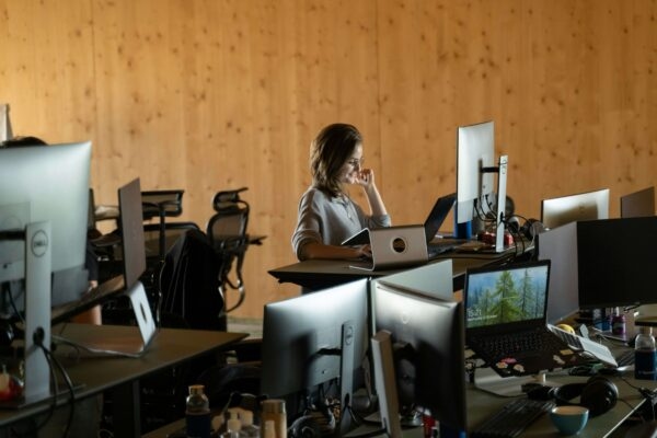 Woman at desk working on computer