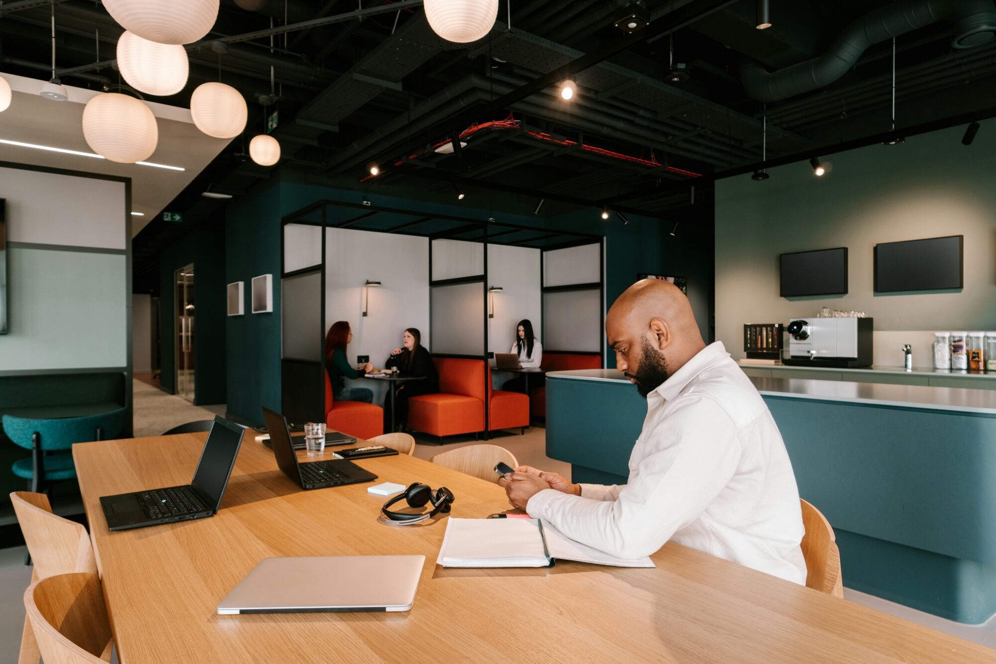 Man working at desk with laptop